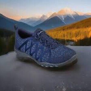 Skechers® Relaxed Fit Breathe Easy Infi-Knity Slip On Sneakers in Navy